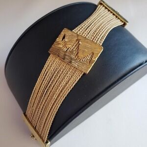 Gold Tone Multi Strand Braided Cord Bracelet Abstract Textured Center Piece